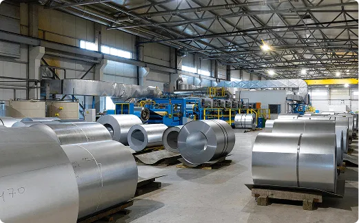 alt="Manufacturing facility floor showing material flow and production operations"